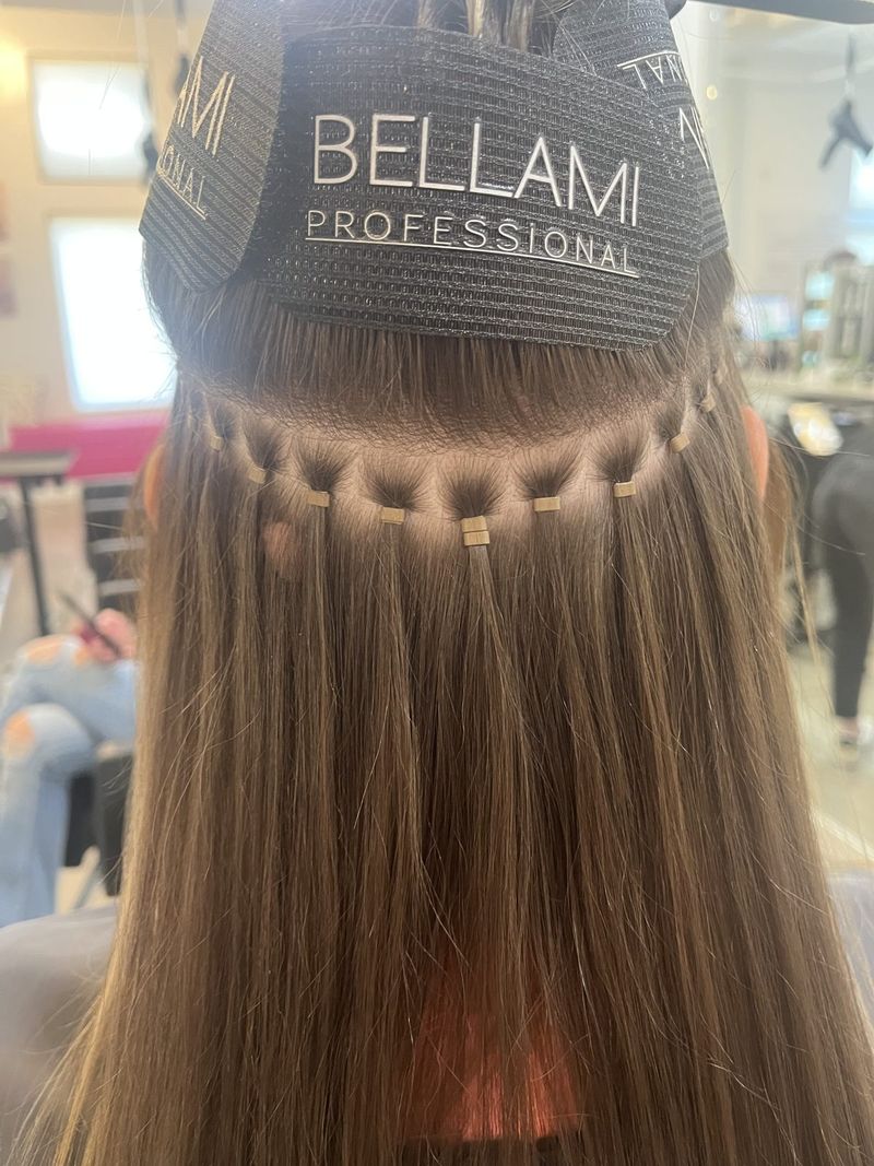 Clean, even rows of Bellami hand-tied extensions during install